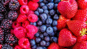 a group of berries and strawberries