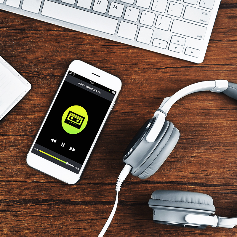 Phone with playlist and headphones