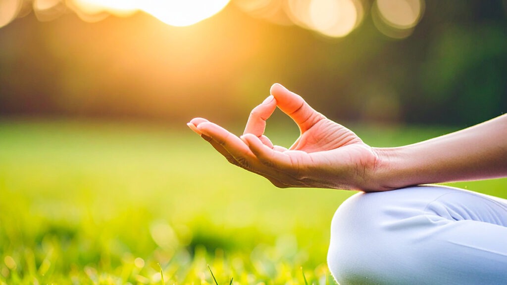 a hand in a yoga pose