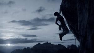 Mental strength - a person climbing a rock